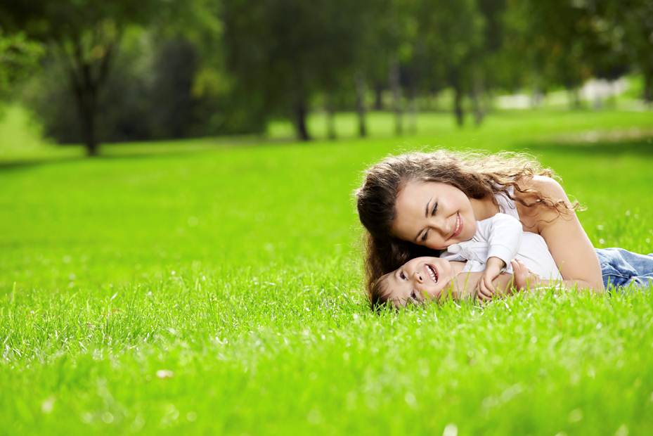 picture of mother and daughter on a lawn
